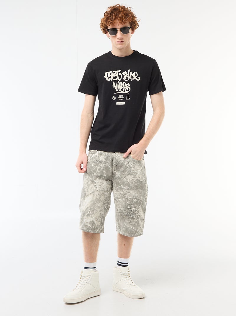 T-shirt estampado com padrão localizado em algodão liso Preto - Kiabi