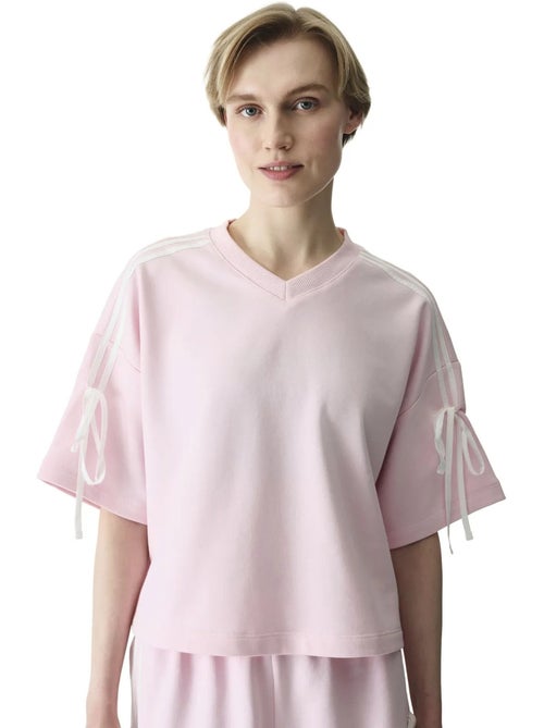 T-shirt feminina com detalhe de laço penti - Kiabi T-shirt feminina com detalhe de laço penti - Kiabi