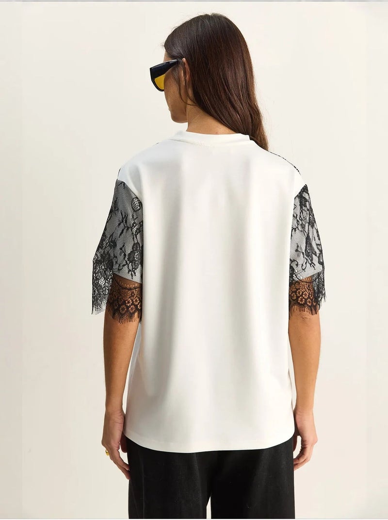 T-shirt feminina em mistura de viscose lucci Branco - Kiabi
