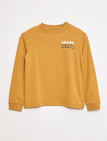 T-shirt folgado com estampado de skate