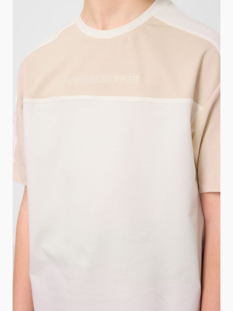 T-shirt infantil oversize gola redonda tommy Branco Bege - Kiabi