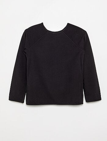T-shirt lisa com mangas raglan