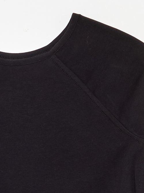 T-shirt lisa com mangas raglan - Kiabi T-shirt lisa com mangas raglan - Kiabi