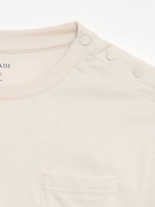 T-shirt lisa de manga comprida com bolso no peito - coleção fácil de vestir - Kiabi