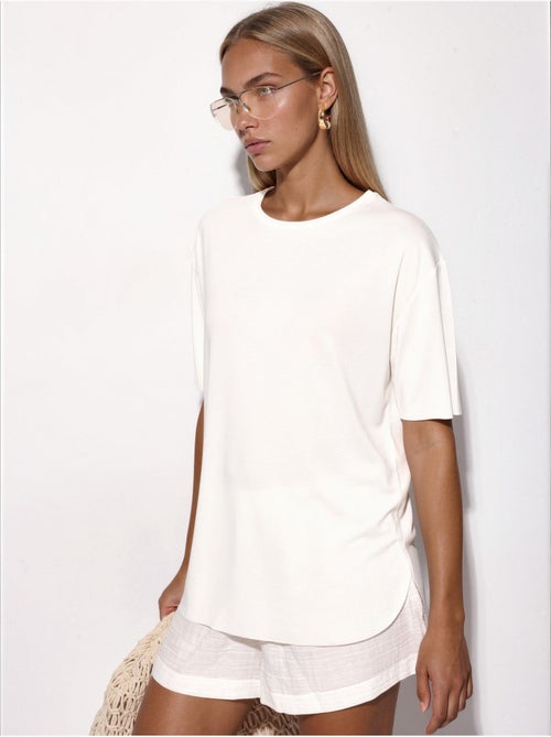 T-shirt loose fit com gola redonda busem - Kiabi T-shirt loose fit com gola redonda busem - Kiabi