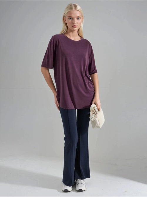 T-shirt loose fit com gola redonda busem - Kiabi T-shirt loose fit com gola redonda busem - Kiabi