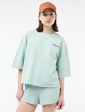 T-shirt oversize com inscrição