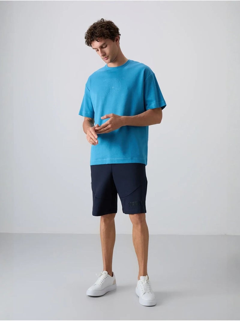 T-shirt oversize de gola redonda em mistura de algodão tommy Azul - Kiabi