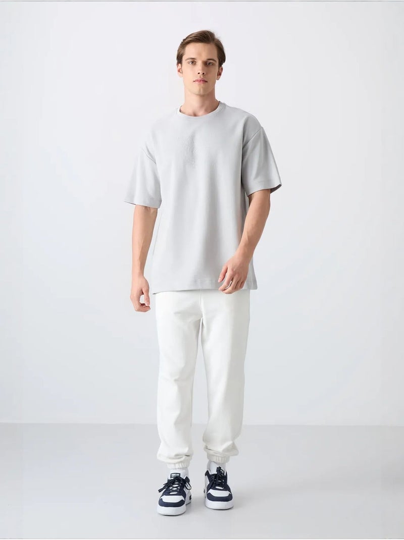 T-shirt oversize de gola redonda em mistura de algodão tommy Cinza claro - Kiabi