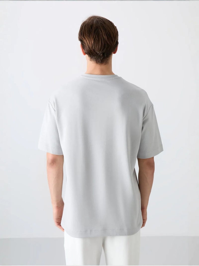 T-shirt oversize de gola redonda em mistura de algodão tommy Cinza claro - Kiabi