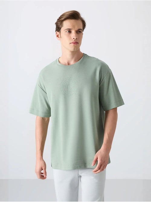 T-shirt oversize de gola redonda em mistura de algodão tommy - Kiabi T-shirt oversize de gola redonda em mistura de algodão tommy - Kiabi