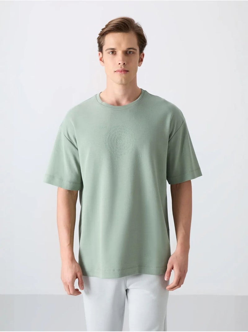 T-shirt oversize de gola redonda em mistura de algodão tommy Verde - Kiabi