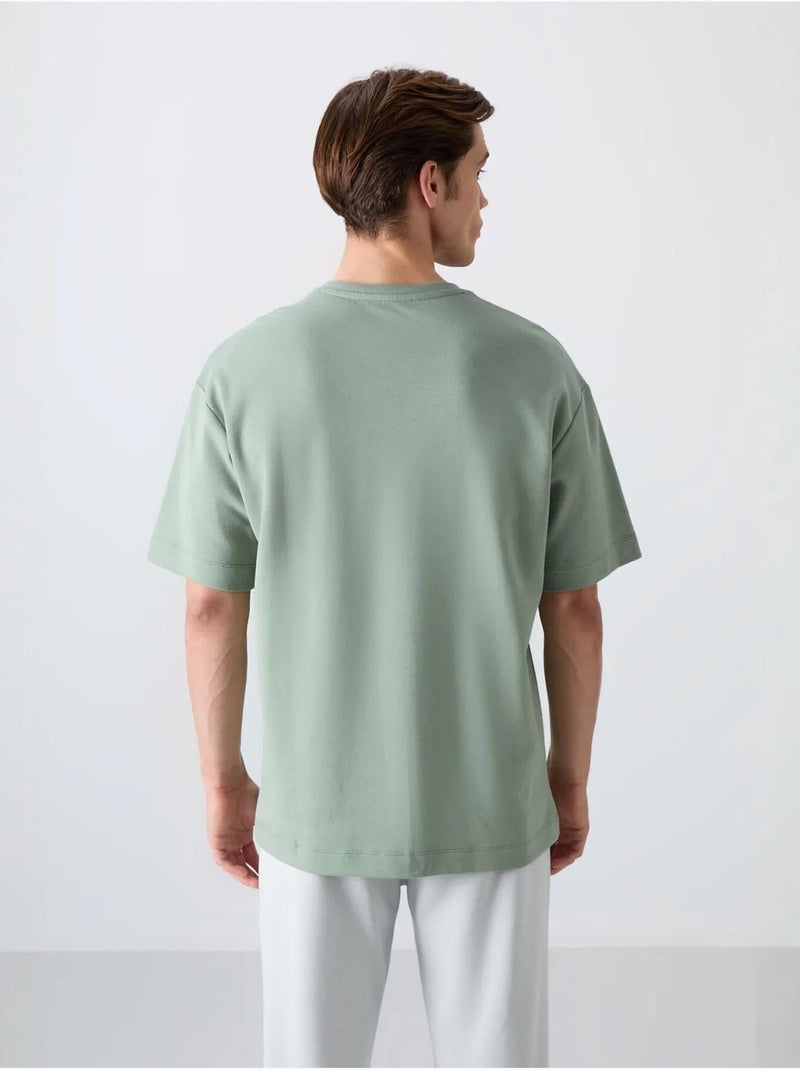 T-shirt oversize de gola redonda em mistura de algodão tommy Verde - Kiabi