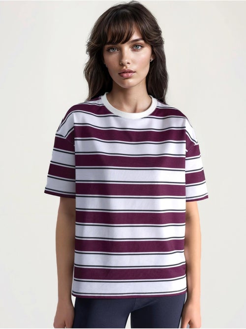 T-shirt oversized às riscas com gola redonda hiccup - Kiabi T-shirt oversized às riscas com gola redonda hiccup - Kiabi