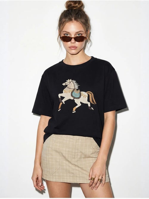 T-shirt oversized com bordado e lantejoulas, gola redonda lucci - Kiabi T-shirt oversized com bordado e lantejoulas, gola redonda lucci - Kiabi