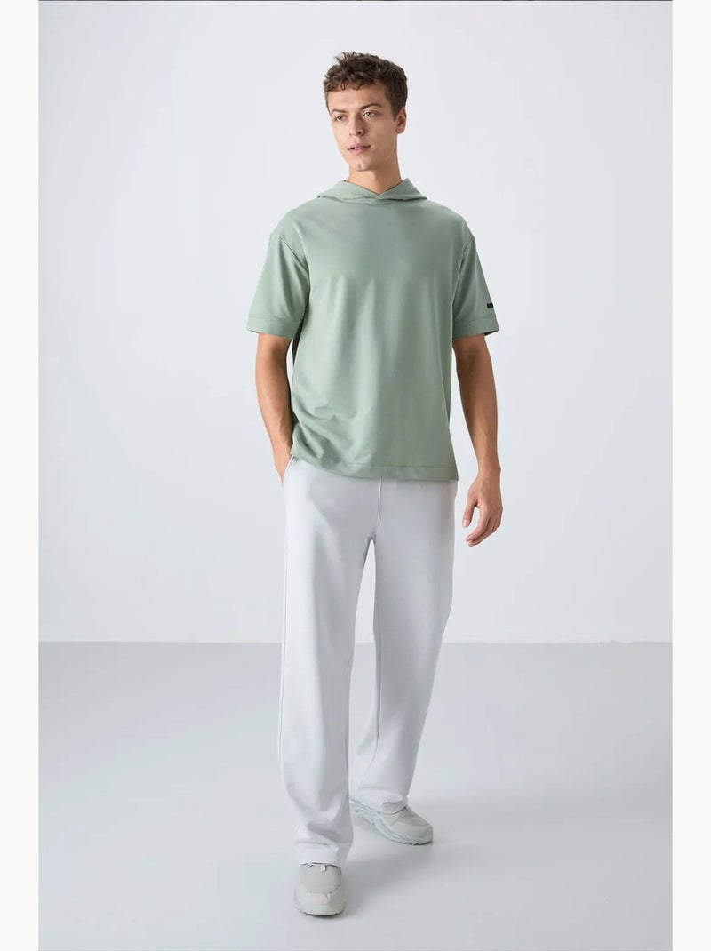 T-shirt oversized com capuz e manga curta tommy Verde menta - Kiabi