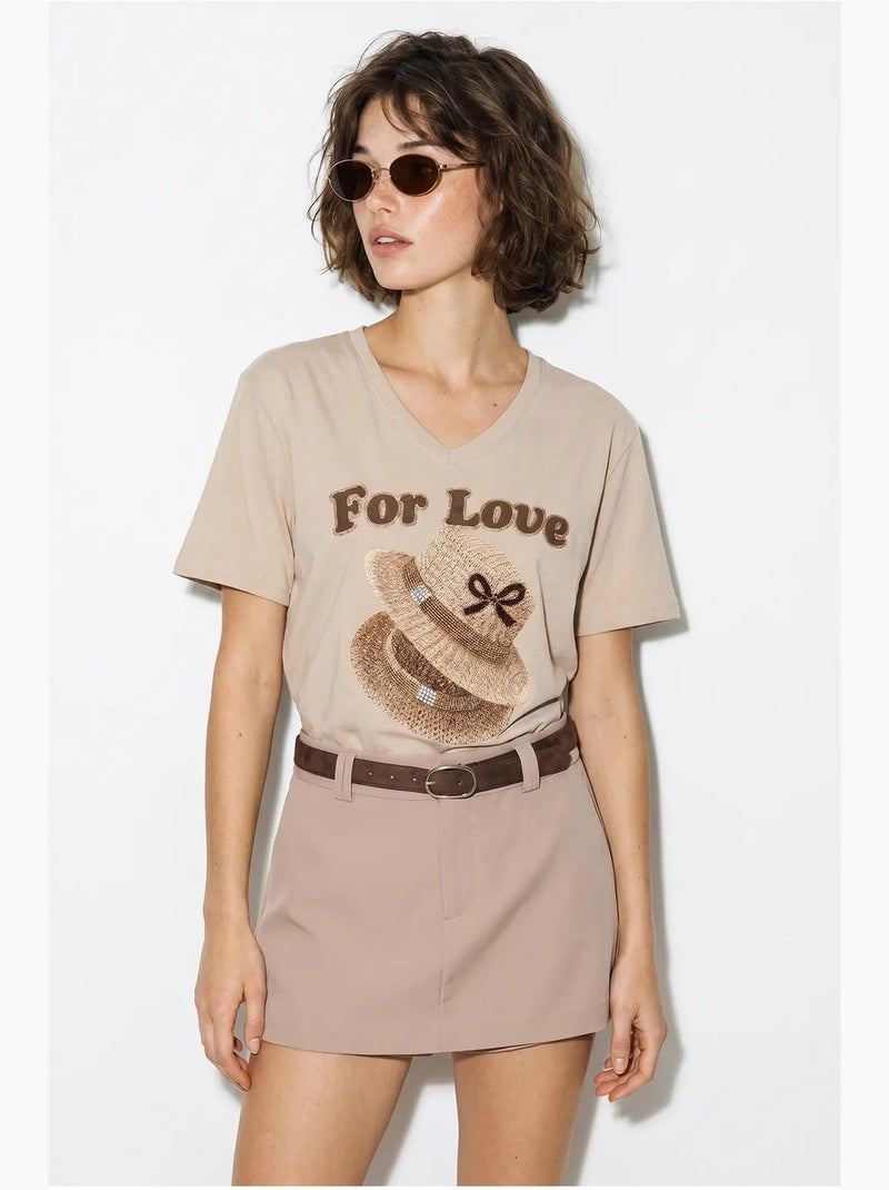 T-shirt oversized com decote em v e estampado lucci Bege-argila - Kiabi