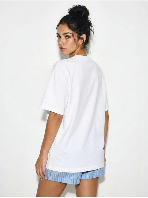 T-shirt oversized com gola redonda e estampado lucci - Kiabi T-shirt oversized com gola redonda e estampado lucci - Kiabi