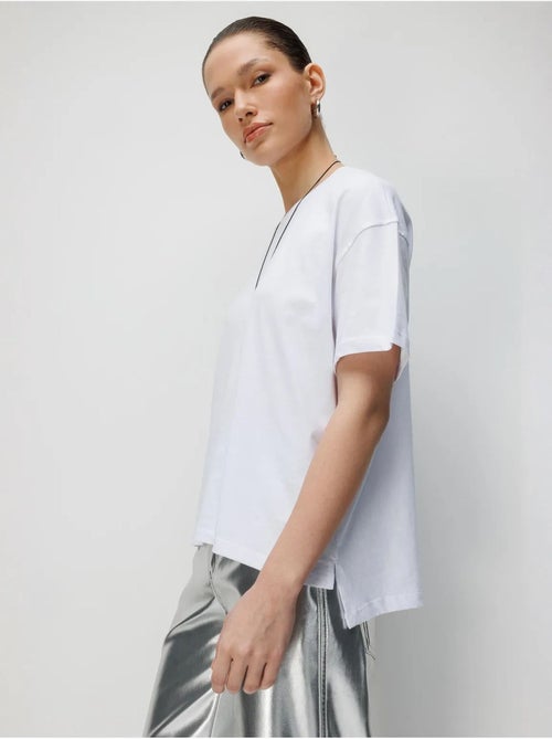 T-shirt oversized de gola redonda lisa com racha mixray - Kiabi T-shirt oversized de gola redonda lisa com racha mixray - Kiabi