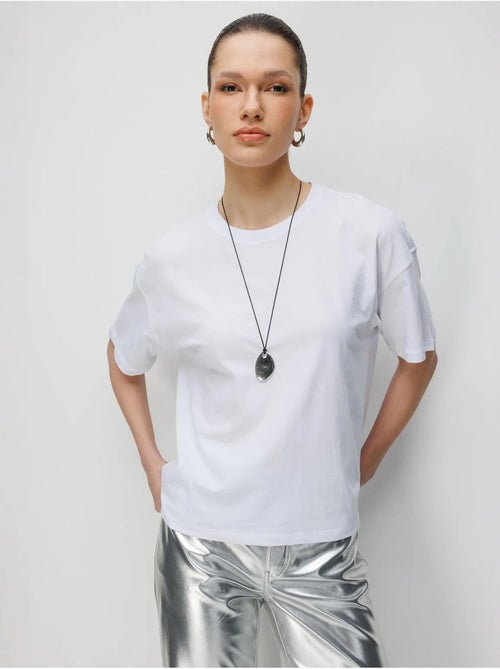 T-shirt oversized de gola redonda lisa com racha mixray - Kiabi T-shirt oversized de gola redonda lisa com racha mixray - Kiabi
