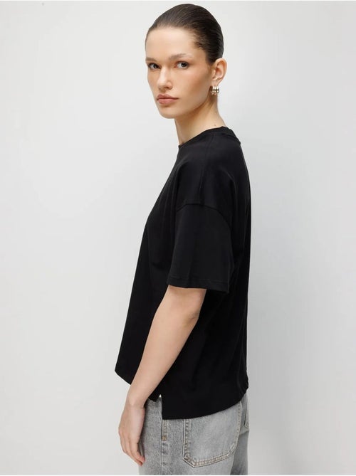 T-shirt oversized de gola redonda lisa com racha mixray - Kiabi T-shirt oversized de gola redonda lisa com racha mixray - Kiabi