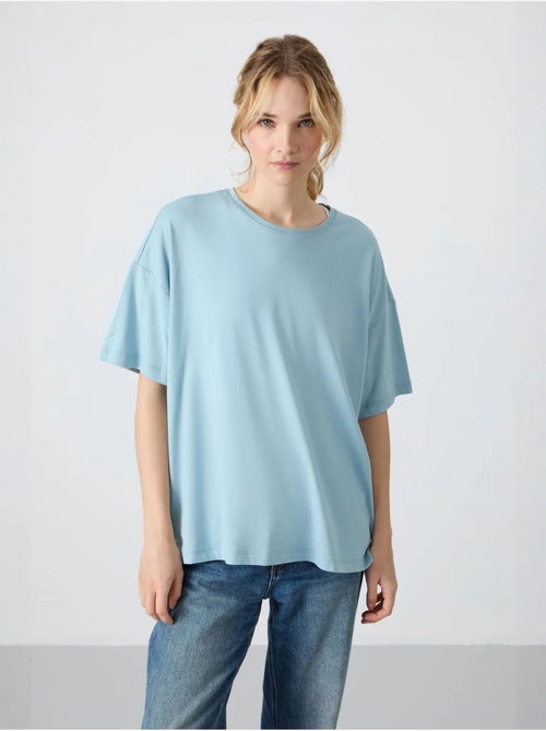 T-shirt oversized em algodão-modal com decote redondo tommy - Kiabi T-shirt oversized em algodão-modal com decote redondo tommy - Kiabi