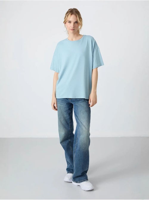 T-shirt oversized em algodão-modal com decote redondo tommy - Kiabi T-shirt oversized em algodão-modal com decote redondo tommy - Kiabi