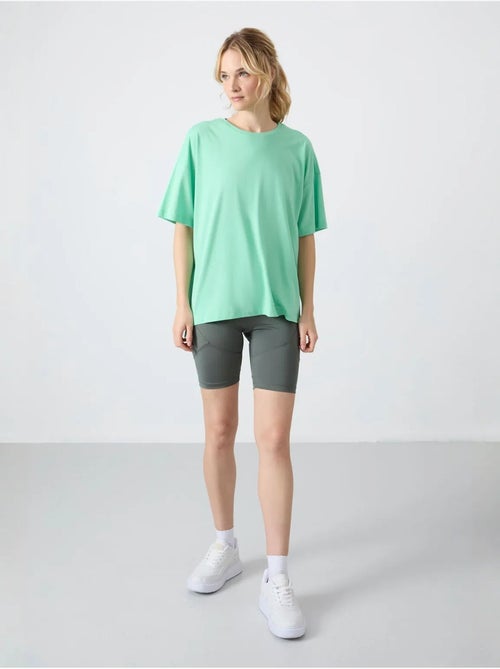 T-shirt oversized em algodão-modal com decote redondo tommy - Kiabi T-shirt oversized em algodão-modal com decote redondo tommy - Kiabi