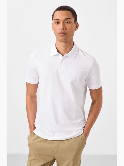 T-shirt polo em malha de mistura de algodão para homem tommy - Kiabi T-shirt polo em malha de mistura de algodão para homem tommy - Kiabi