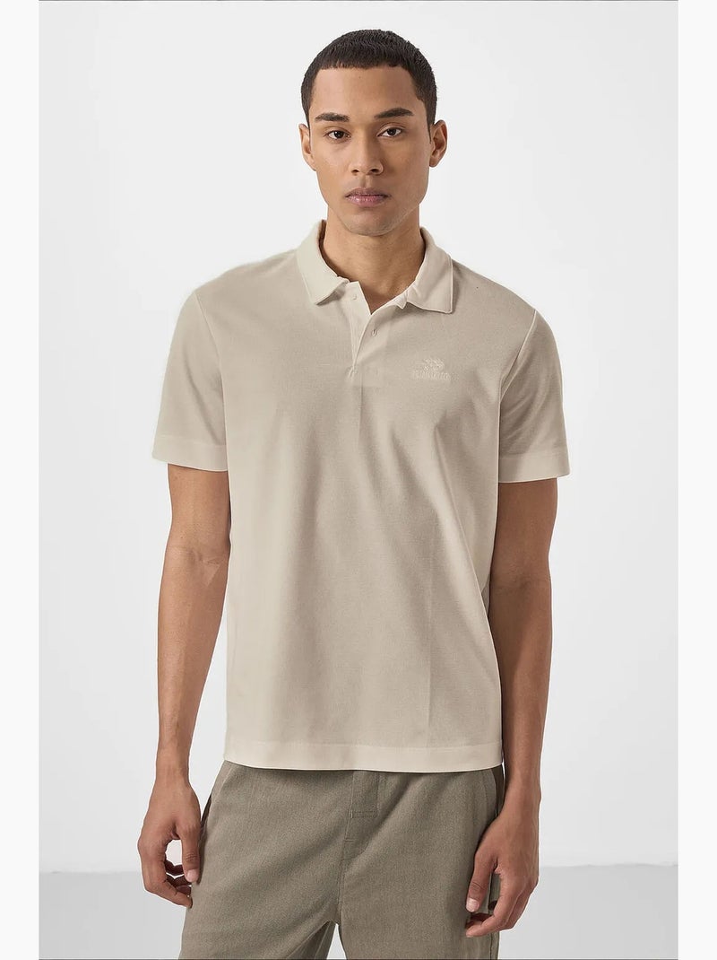 T-shirt polo em malha de mistura de algodão para homem tommy Bege-argila - Kiabi