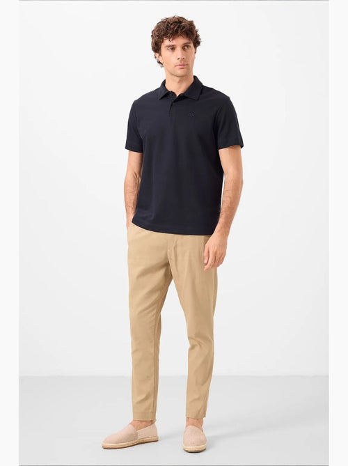 T-shirt polo em malha de mistura de algodão para homem tommy - Kiabi T-shirt polo em malha de mistura de algodão para homem tommy - Kiabi
