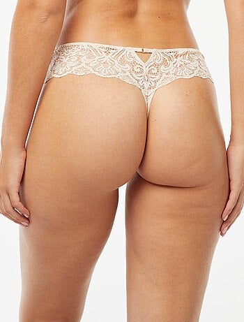 Tanga de renda transparente com joia de fantasia
