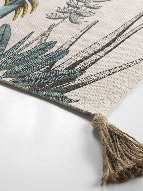 Tapete estampado com folhagens exóticas e pompons - Kiabi