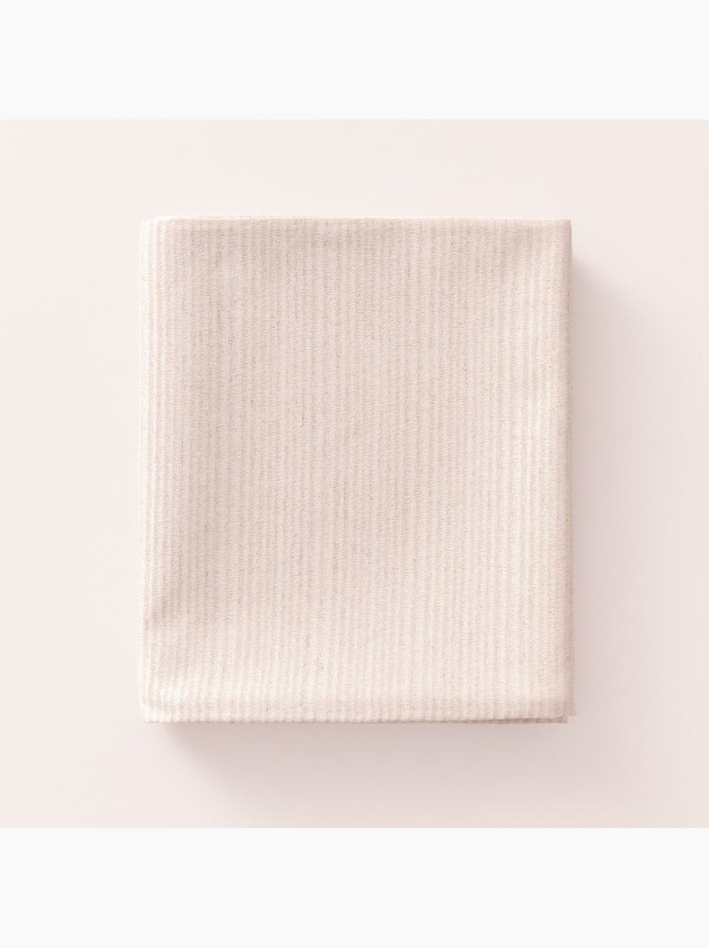 Toalha de mesa antinódoas com tecido texturizado às riscas finas - Gamusi. Bege - Kiabi