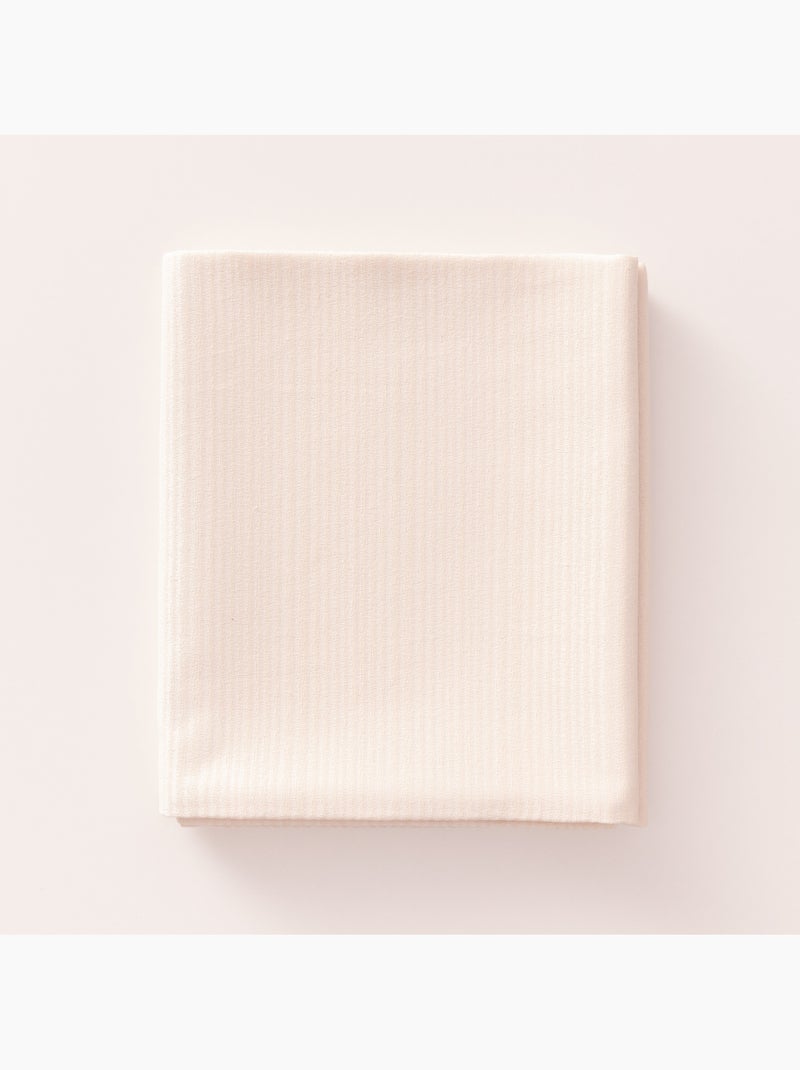 Toalha de mesa antinódoas com tecido texturizado às riscas finas - Gamusi. Creme - Kiabi