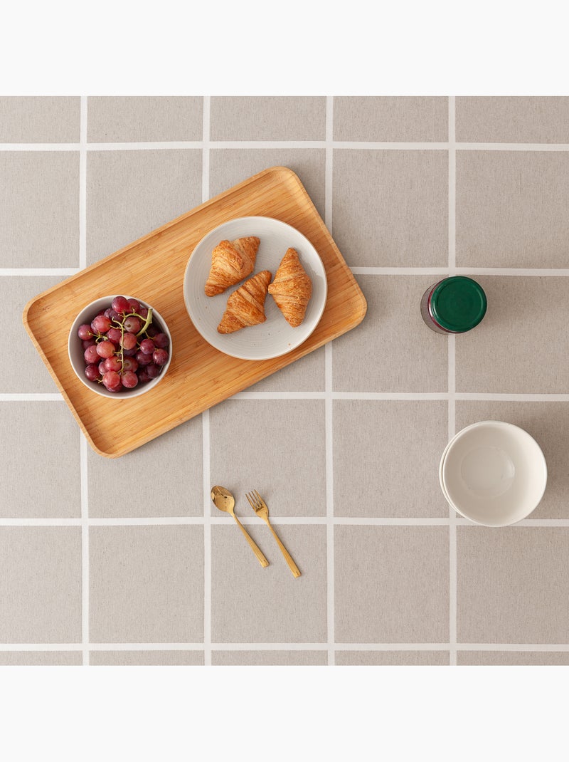 Toalha de mesa antinódoas com tecido texturizado e quadrados grandes - Gamusi. Bege - Kiabi
