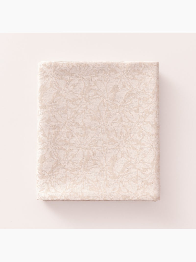 Toalha de mesa antinódoas com tecido texturizado floral - Gamusi. Bege - Kiabi