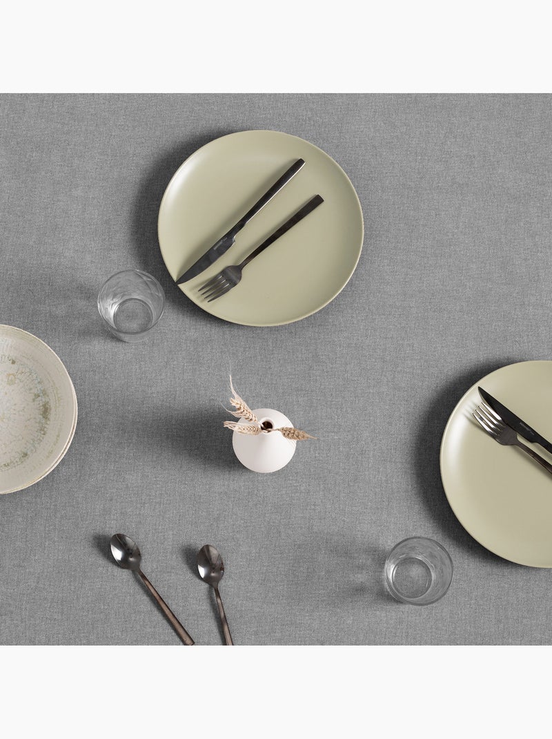 Toalha de mesa antinódoas de algodão, lisa e mesclada, com caimento natural - Gamusi. Cinza - Kiabi