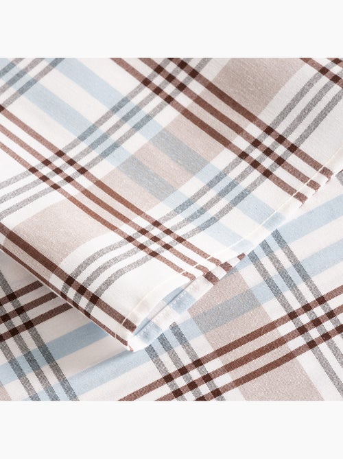 Toalha de mesa antinódoas tartan, toque e caimento natural - Gamusi. - Kiabi Toalha de mesa antinódoas tartan, toque e caimento natural - Gamusi. - Kiabi