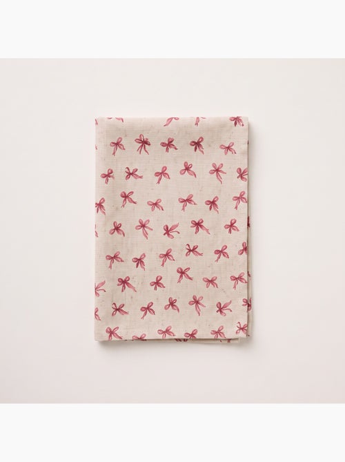 Toalha de mesa de natal com toque de linho natural e estampado de laços - gamusi. - Kiabi Toalha de mesa de natal com toque de linho natural e estampado de laços - gamusi. - Kiabi