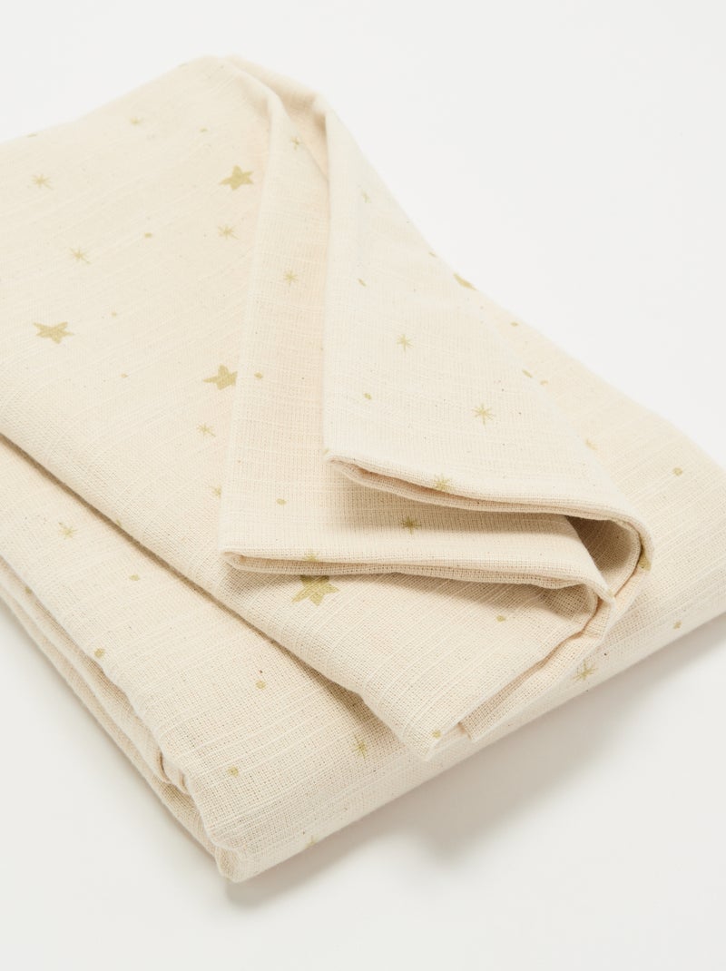 Toalha de mesa de Natal estampada 'estrelas' - KIABI Home Cru - Kiabi
