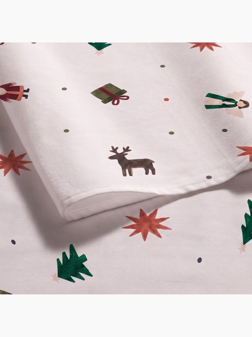 Toalha de mesa de natal impermeável com estampado de pai natal, renas, presentes e abetos - gamusi. - Kiabi Toalha de mesa de natal impermeável com estampado de pai natal, renas, presentes e abetos - gamusi. - Kiabi