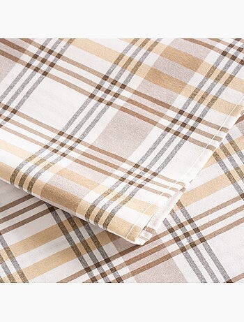 Toalha de mesa redonda antinódoas com design tartan, toque e caimento natural - Gamusi.