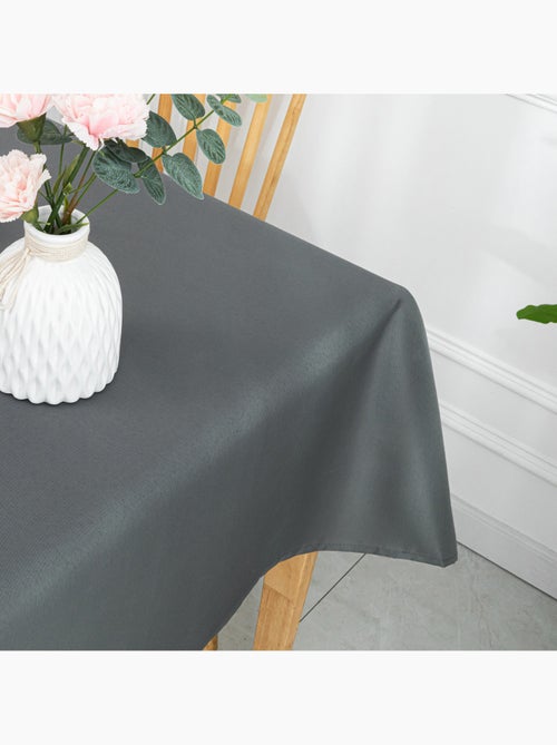 Toalha de mesa retangular, revestida e resistente a manchas - Kiabi Toalha de mesa retangular, revestida e resistente a manchas - Kiabi