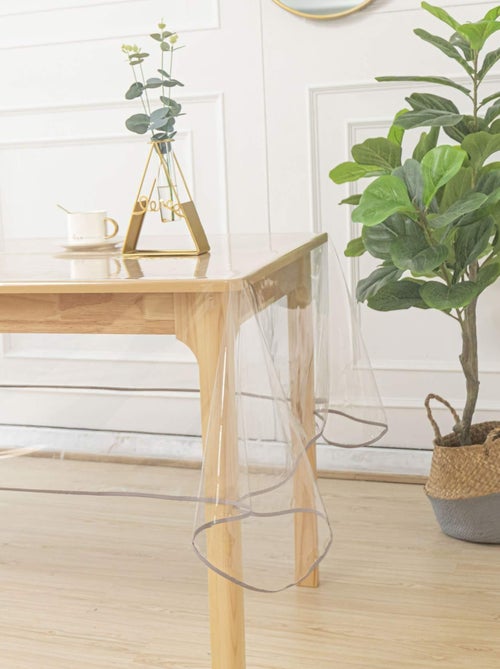 Toalha de mesa transparente retangular - Kiabi Toalha de mesa transparente retangular - Kiabi