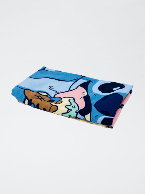 Toalha de praia 'Disney' 'Stitch' 70x140 cm - Kiabi Toalha de praia 'Disney' 'Stitch' 70x140 cm - Kiabi