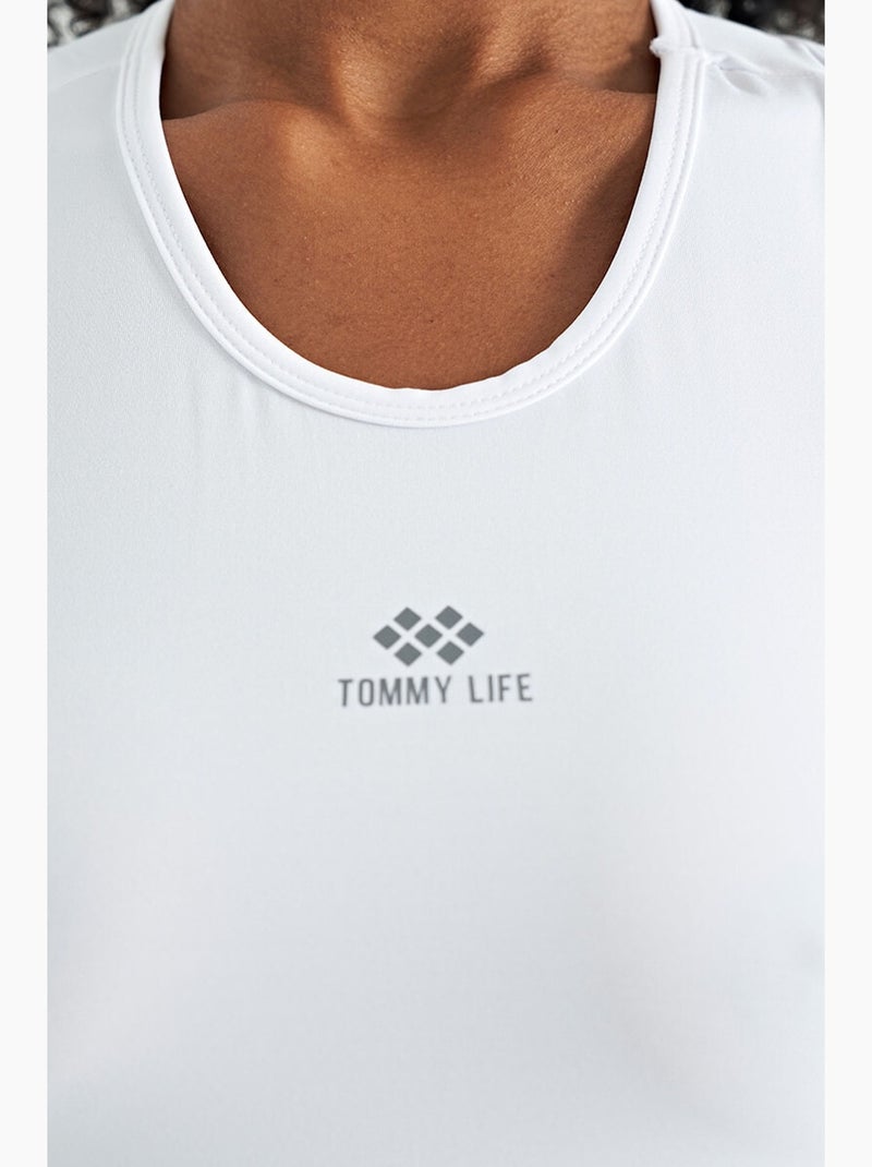 Top active sem mangas com decote redondo tommy Branco - Kiabi