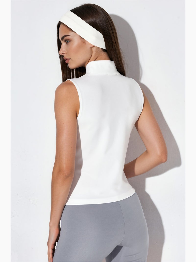 Top ativo ajustado sem mangas com gola alta hiccup Branco - Kiabi