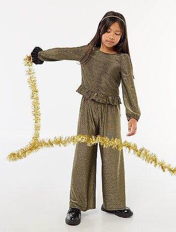 Top brilhante em malha com beijos e folhos