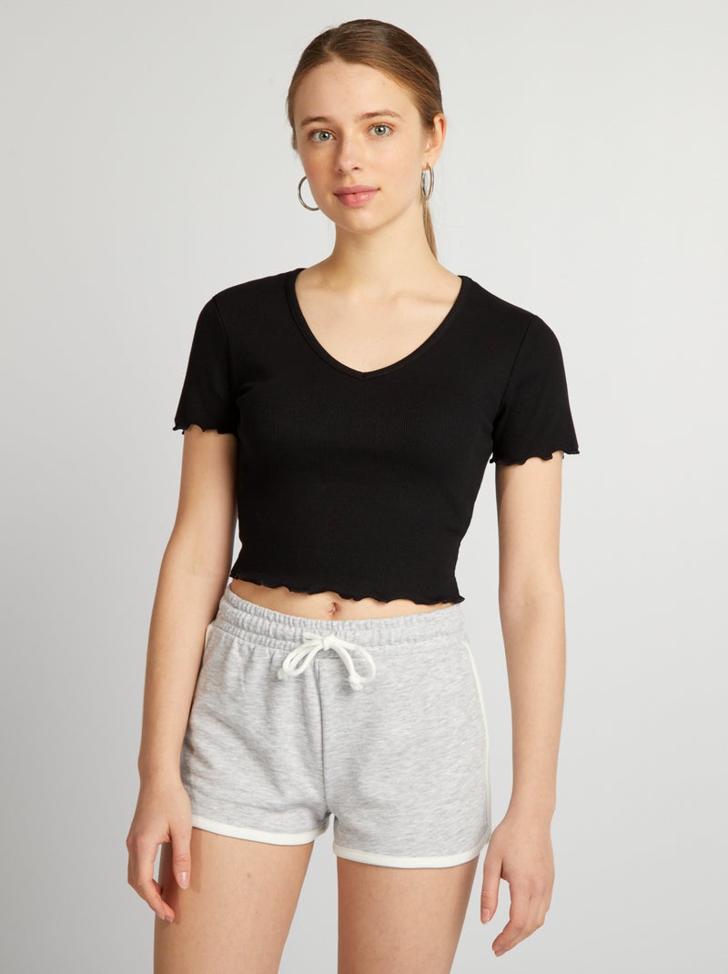 Top crop com rebordos ondulados Preto - Kiabi